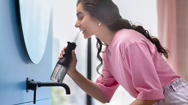 Ирригатор Philips Sonicare Cordless Power Flosser 3000 HX3826/33, черный - Pampik - 7