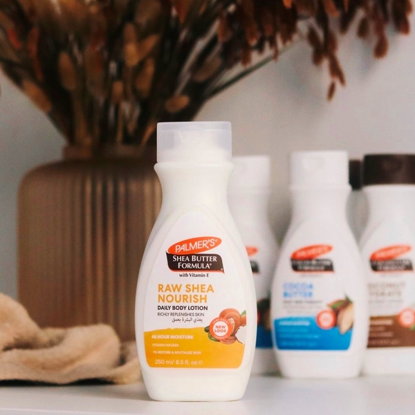 Лосьйон для тіла Palmer's Shea Butter Formula Raw Shea Nourish з олією ши та вітаміном Е 250 мл - Pampik - 11