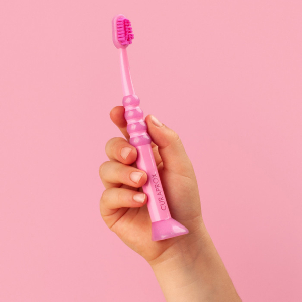 Зубная щетка детская Curaprox CS Baby с прорезиненной ручкой, розовый - Pampik - 4