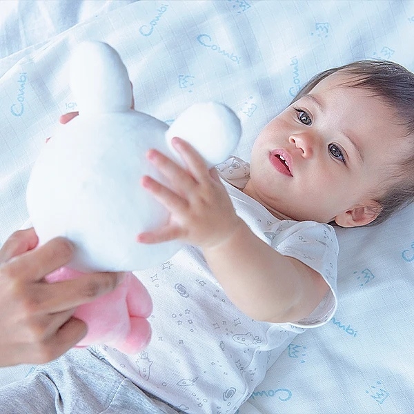 Мягкая музыкальная игрушка-ночник Combi Зайчик 118784, розовый (36825) - Pampik - 3