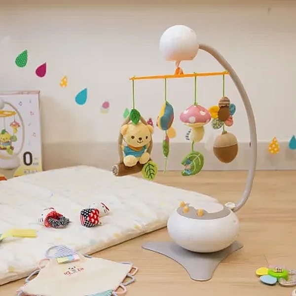 Музичний мобіль Combi 14086 з підвісними іграшками та звуковим сенсором (17256) - Pampik - 4