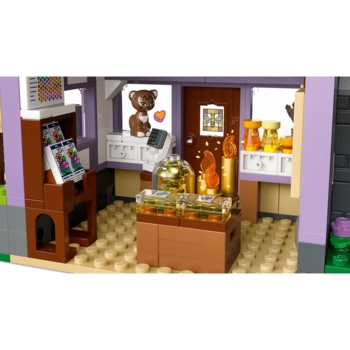Конструктор LEGO Friends Будиночок і квітник бджолярів, 1161 деталь (42669) - Pampik - 8