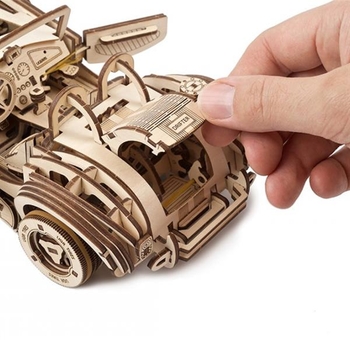 Деревянный механический 3D конструктор Ugears Гоночный автомобиль ДрифтКобра (70161) - Pampik - 15