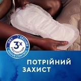 Урологічні прокладки Tena Lady Maxi Night, 12 шт. - Pampik - 8