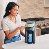 Машина для приготування дитячої суміші Baby Brezza Formula Pro Advanced темно-сіра (FRP0132) - Pampik - 8