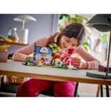 Конструктор LEGO Friends Будиночок і квітник бджолярів, 1161 деталь (42669) - Pampik - 4